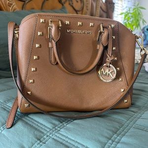 Michael Kors cross body, brown in good used condition